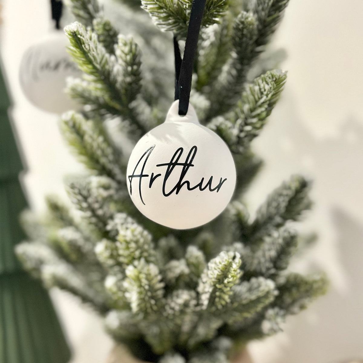 Rustic ceramic with a black satin ribbon