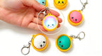 Glowing Dumpling Fidget Keychain – Press It and It Lights Up