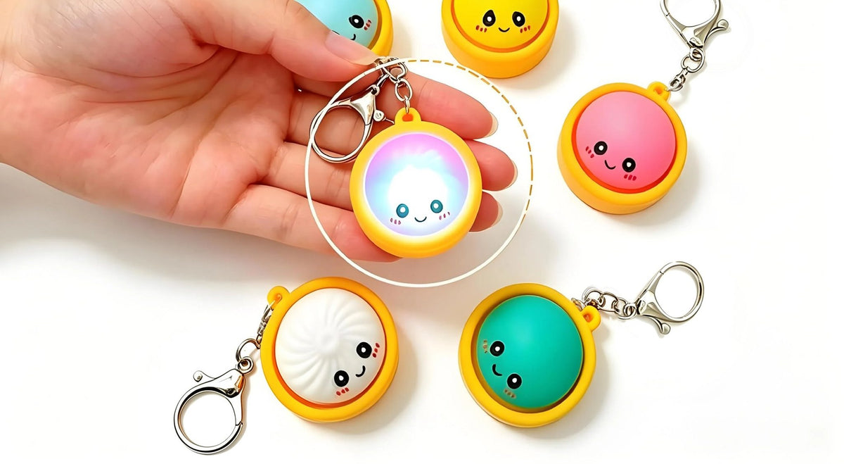 Glowing Dumpling Fidget Keychain – Press It and It Lights Up